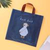 Ropa de Celebridad de Internet Bolso de Mano Estampado de Dibujos Animados a Doble Cara Bolsa de Regalo de Centro Comercial Bolso de Mano de Plástico de Tienda de Ropa con Logotipo Impreso