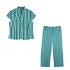 Venta al por mayor para comercio exterior 2026 Moda europea y americana casual top de rayas ajustado anudado + conjunto de pantalones largos para mujer B56331