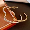 Pulsera Abierta de Onda Irregular Transfronteriza Europea y Americana, Pulsera de Moda y Única, Lujo Ligero, Gama Alta, Joyería Simple al por Mayor