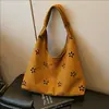 Bolsa de Ombro Feminina Recorte Retro Coreana Outono e Inverno 2025 Nova Bolsa Tote para o Trabalho Bolsa de Mão Casual em Camurça