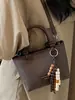 Bolsa Casual de Nicho Feminina Grande Capacidade Outono 2025 Nova Bolsa de Balde Simples Bolsa Transversal da Moda para Senhora