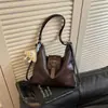 Mochila de nicho para mujer 2026 nueva moda versátil de gran capacidad bolso de hombro versión coreana bolso de mano simple