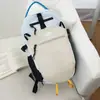 Mochila impermeable de color contrastante ligera transfronteriza casual de gran capacidad para ciclismo bolsa para deportes al aire libre montañismo mochila escolar mujeres