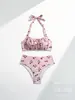 Nuevo traje de baño bikini de dos piezas estilo europeo y americano transfronterizo 2027 con estampado retro, con diseño push-up y tiras de atar, para mujer