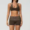 Nuevo conjunto de yoga de lunares Zechuang con tirante halter, diseño de dos piezas falso, conjunto deportivo de secado rápido para correr y fitness 4549