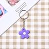 Llavero de Campana de Flor Pequeña Fresca y Colorida Estilo Coreano Colgante de Anillo de Llave Color Caramelo Decoración para Bolso de Mujer Venta al por Mayor