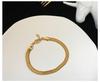Comercio exterior Taobao joyería INS nicho Europa y Estados Unidos CL2025 hueso de serpiente borla temperamento moda pendientes largos para mujer pendientes