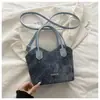 El popular bolso tipo cubo de estilo fresco para mujer de este año es el nuevo modelo de otoño 2026, con una textura ligera y lujosa, adecuado para ir al trabajo y se puede llevar al hombro o cruzado.