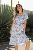 Producto Nuevo Transfronterizo 2025 Verano Europeo y Americano Nuevo Vestido de Playa con Estampado de Dobladillo Ancho, Cuello en V, Cintura Alta, Manga Corta, Vestido de Gasa