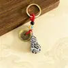 Llavero con colgante de carpa hueca de aleación, charm para collar, decoración colgante, pequeño accesorio decorativo al por mayor