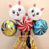 Globo de película de aluminio de dibujos animados sosteniendo 18 pulgadas apertura escolar de jardín de infantes centro comercial 61 juguetes para niños para empujar pequeños regalos