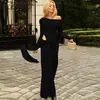 Ropa Europea y Americana Transfronteriza 2025 Nuevo Otoño Color Sólido Cuello Redondo Manga Larga Falda Larga Vestido Delgado con Tiras Cortadas para Mujer