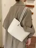 Bolso tote único, simple, elegante y de alta calidad, nuevo modelo de verano 2026, color liso, de nicho, casual, bolso de hombro de alta apariencia, moderno