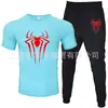 2025 Novo Conjunto Casual Esportivo Masculino de Duas Peças: Camiseta de Manga Curta e Calça, Verão, Gola Redonda, Cor Lisa, Estampado