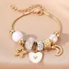 Pulsera de cuentas de resina con flores de dibujos animados de venta cruzada europea y americana, joyería de aleación con colgante de cuentas DIY Panjia al por mayor