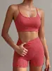 Nuevo conjunto de yoga transfronterizo para mujer, adecuado para deportes y fitness, incluye sujetador sexy de cuadros de lunares y pantalones de tres cuartos, conjunto de dos piezas