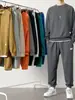 Novo conjunto de moletom em tricô waffle para homens, outono, camiseta de manga comprida cor sólida e calça comprida, esportivo e casual, atacado transfronteiriço