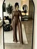 723 Conjunto de dos piezas de otoño/invierno nuevo para mujer, transfronterizo europeo y americano: top liso de manga larga ajustado + pantalones de pierna ancha con rayas de contraste