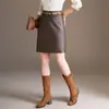 Falda de cuero ajustada que cubre la cadera para mujer, nuevo estilo otoño 2026, elegante, versátil, rejuvenecedora, de cintura alta, minifalda, ajustada a la cadera, moderna