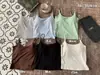Novo Colete Feminino Primavera/Verão Versátil Hot Girl Vazado Costas Bonitas Cor Sólida Pequena Camisola Sem Sutiã Necessário Camisola Camada Base Camada Base