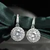 Nuevo pendiente redondo de moda para mujer, lujo ligero, diseño de nicho, pendientes de diamantes completos, joyería para orejas elegante para street style