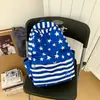 Mochila feminina transfronteiriça 2026 estilo coreano, design de bolinhas, fofa, adequada para alunos do ensino fundamental e médio