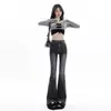 Jeans retro acampanados para mujer, colección otoño 2026, de tiro alto, adelgazantes, elásticos, de corte holgado, pierna ancha y que favorecen la figura.
