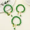 [Venta al por mayor directa de fábrica] Nuevo estilo chino Imitación Jade Dongling Puesto de Exhibición de Feria de Templo del Mercado Nocturno Pulsera de Vidrio Joyería Más Vendido