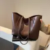 Bolso tote de mujer más vendido transfronterizo, gran capacidad, nuevo modelo 2026, bolso de hombro simple para el día a día, adecuado para ir de compras y al trabajo, bolso de axila
