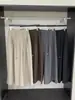 Pantalones casuales versátiles de pierna ancha para mujer, transpirables y cómodos para primavera y otoño, diseño holgado y relajado con detalles plisados