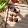 Pendientes con estampado de leopardo flocado de otoño e invierno 2024, nuevos y populares pendientes de alta sensación, pendientes ligeros de lujo de nicho, pendientes de temperamento únicos para mujer