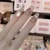 Hilo de Estrella de Luz Suave Hecho a Mano Puro Uñas Postizas Ojo de Gato Estilo Francés Gama Alta Blanqueamiento Pegatinas para Uñas Arte de Uñas Piezas para Uñas Producto Terminado