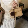 Bolso de Mano para Mujer 2026 Nuevo Modelo Nicho Súper Popular para Oficina Viaje al Trabajo Bolso de Hombro Cruzado Moderno Versátil Pequeño Cuadrado