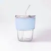 Vaso de vidrio estilo bambú minimalista, alto valor estético, vaso con popote para el hogar, pequeño regalo para inauguraciones de negocios, vaso de agua simple para venta al por mayor