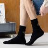 Calcetines para hombre otoño e invierno calcetines estampado en caliente letra raya color sólido calcetines de algodón desodorantes calcetines altos al por mayor