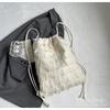 Bolsa de Lona Casual Coreana para Mulheres 2026 Nova Mochila com Cordão de Grande Capacidade Mochila Escolar Elegante de Renda