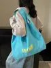 Bolso de Hombro Nuevo de Nicho con Estampado de Letras y Diseño de Gran Capacidad, Bolso Tote de Lona Versátil Dopamina para Mujer, Bolso de Compras