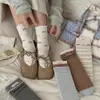 Temporada de primavera y otoño, calcetines a rayas con lazo, estilo coreano dulce y preppy, calcetines de algodón puro hasta la mitad de la pantorrilla, calcetines de mujer sin costuras