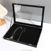 Caja de Embalaje para Joyería Transparente Visible Caja de Almacenamiento para Anillos Collares Hogar Pu Simple Negra Caja de Embalaje para Joyería Venta al por Mayor