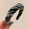 Nova faixa de tecido de cor de outono e inverno estilo coreano ins alta Skull top temperamento elegante cor misturada tiara de lã de malha para mulheres