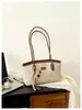 Bolsa de Mão Simples de Nicho Estilo Coreano Feminina 2026 Nova Tendência para o Trabalho Casual Bolsa de Ombro Único Bolsa Baguete de Moda