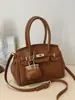 Elegante bolsa pequena de um ombro para mulheres, nova bolsa transversal versátil primavera/verão 2026, bolsa de mão requintada, moderna e da moda