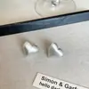 Diseño de alta gama sentido clip para oreja plateado sin agujero estilo frío nuevo lujo ligero estilo simple diseño de nicho clip para oreja en forma de C