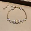 Exquisito brazalete de perlas estilo francés, moderno y sofisticado, diseño creativo para el uso diario, accesorio elegante y versátil