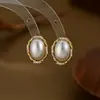 Estilo Modesto Diseño de Nicho Pendientes de Perla Pendientes Geométricos Ovalados Estilo Esencial para el Viaje Diario