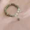Pulsera china nueva Piedra natural Turmalina sandía Piedra rosa Jade de Xinjiang Pulsera de cristal de cuarzo Pulsera Novia Dopamina