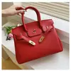 Estilo explosivo de moda transfronteiriça bolsa grande de mão feminina 2026 nova bolsa vermelha de casamento da moda bolsa tote transversal de grande capacidade