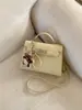 Bolso de Mano Texturizado de Nicho Estilo Francés 2025 Nuevo Bolso para Mujer Moda Bolso Cruzado Simple Cuadrado Pequeño Casual de Moda
