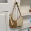 Diseño de nicho transfronterizo, modelo nuevo simple para la primavera de 2026, bolso de mujer de alta calidad, bolso de hombro para debajo del brazo, bolso tipo dumpling