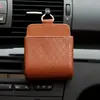 Nueva Caja de Almacenamiento para Coche Salida de Aire del Coche Cuero Multifuncional Bolsillo Colgante de Almacenamiento para Teléfono Móvil Cigarrillos Monedas Tarjetas